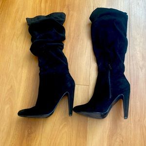 Slouchy black heeled boots